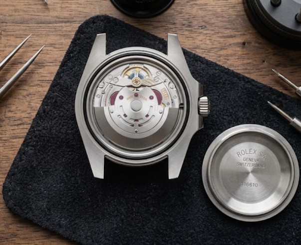 Opened caseback showing the caliber
